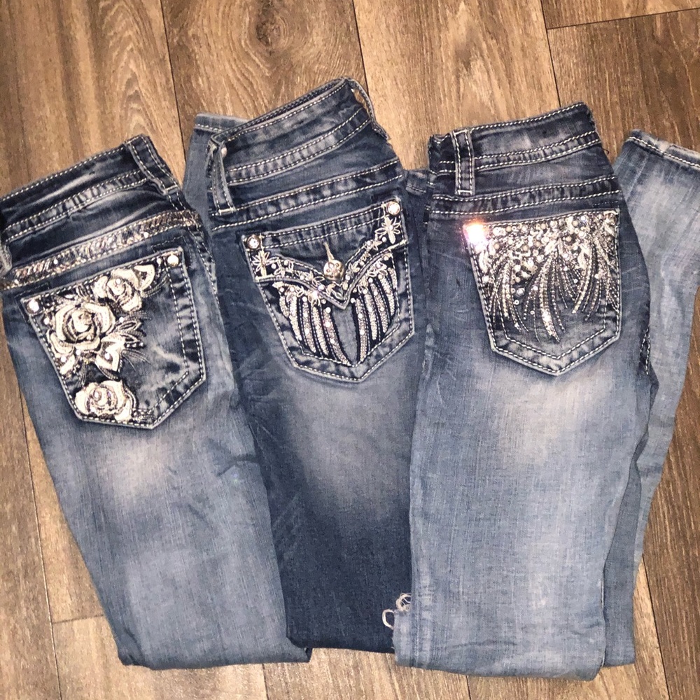 Three pairs of Miss Me jeans